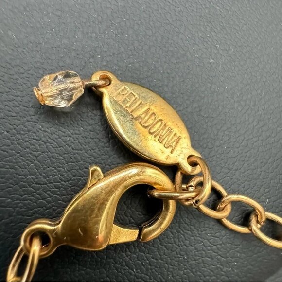 Belladonna Circular Crystal and Gold Tone Infinity Pendant Necklace - Picture 10 of 17